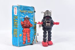 A BOXED KO TOYS (JAPAN) TINPLATE CLOCKWORK ACTION PLANET ROBOT, black body with red plastic hands