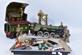 TWO BRASS MINING DIORAMAS, brass models of men & tubs, one with pit head gear mounted on wooden