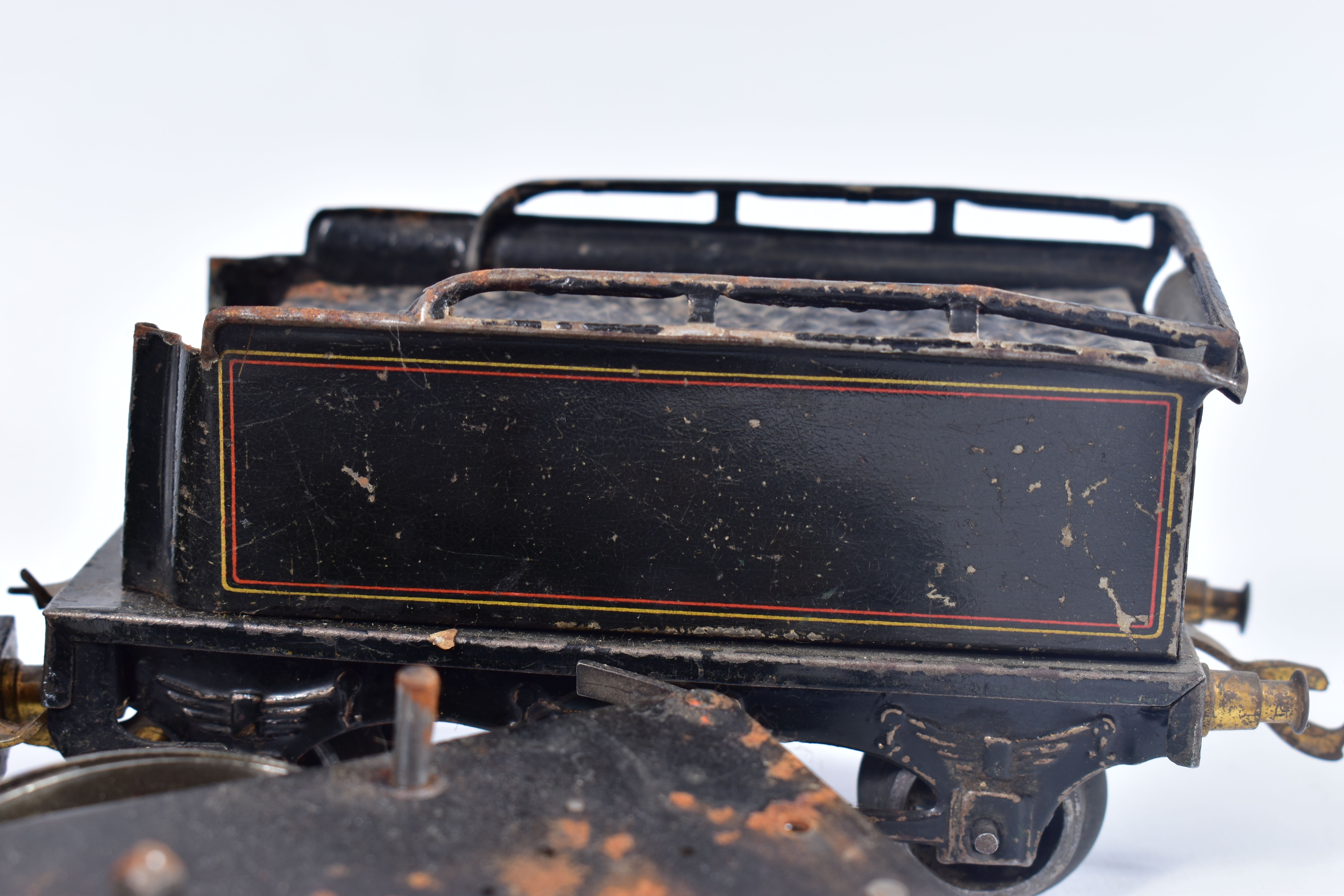 A BING CLOCKWORK O GAUGE 0-4-0 LOCOMOTIVE AND TENDER, No.3768, lined black livery, dismantled and in - Image 3 of 4