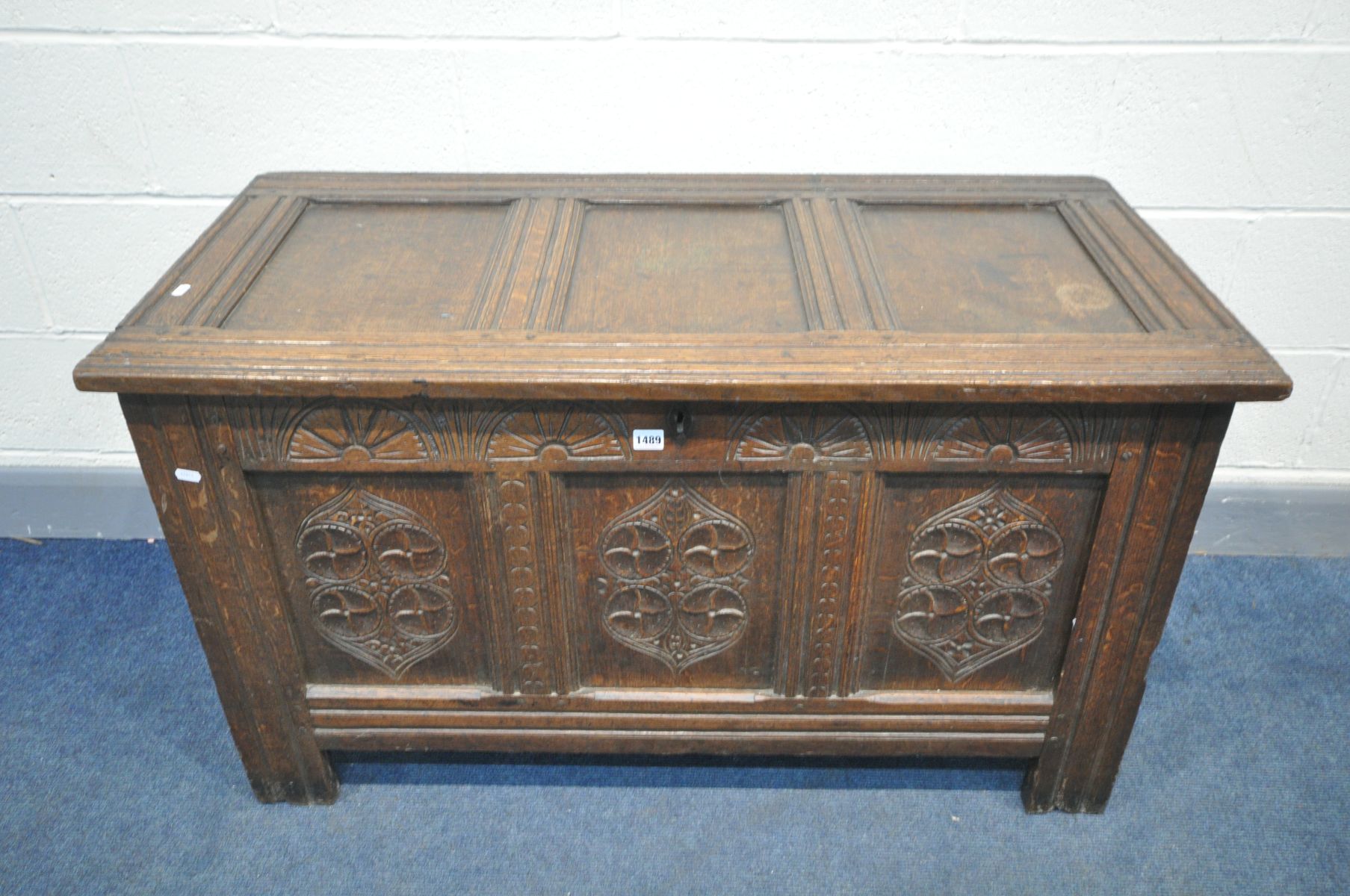 A GEORGIAN OAK COFFER, with carved panels, width 120cm x depth 57cm x height 68cm