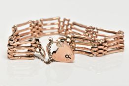 A 9CT ROSE GOLD GATE BRACELET, a four row rose gold gate bracelet (solder marks to some of the links