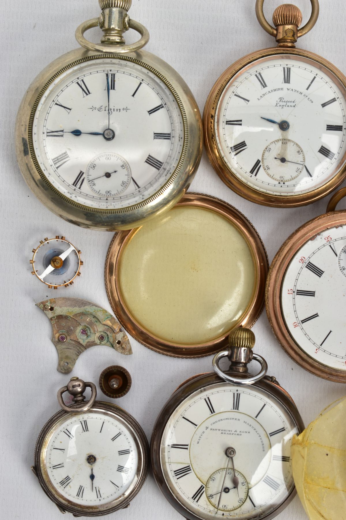 A SELECTION OF POCKET WATCHES, to include a small silver open face watch with a white dial, Roman - Image 4 of 8