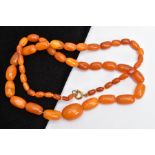 A NATURAL AMBER BEAD NECKLACE, graduated oval beads, largest measuring approximately 20.7mm x 15.