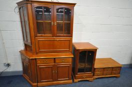 A YOUNGER CHERRYWOOD COCKTAIL CABINET, the double glazed top over a fall front section, two drawer