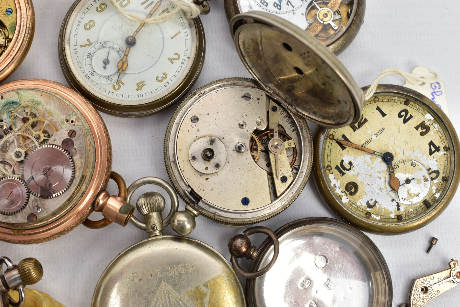 A SELECTION OF POCKET WATCHES, to include a small silver open face watch with a white dial, Roman - Image 7 of 8