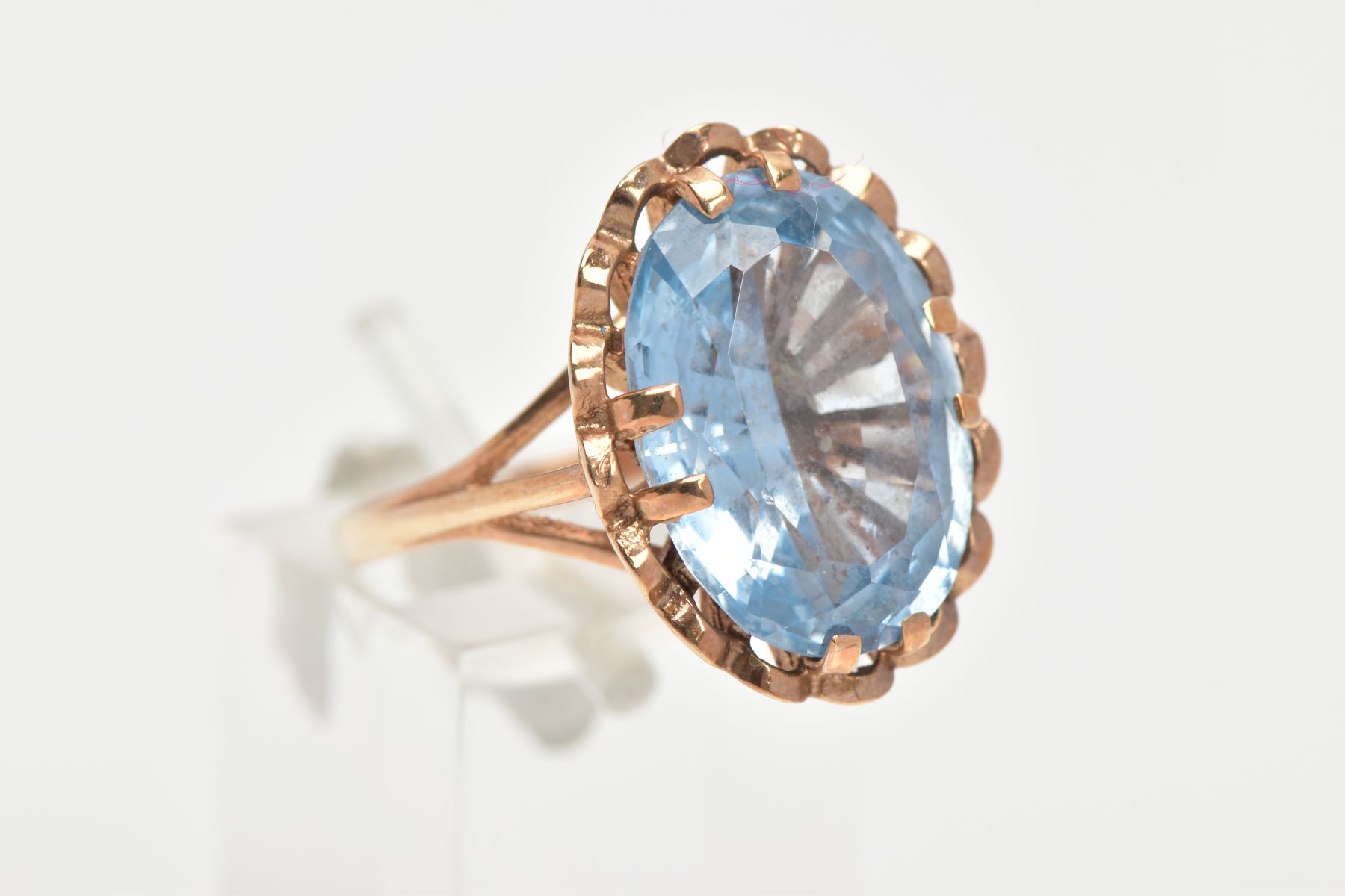 A TOPAZ DRESS RING, a large oval cut blue stone assessed as topaz, approximate length 17mm, - Image 4 of 4