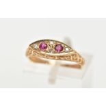 A 9CT GOLD RUBY AND DIAMOND BOAT RING, a navette shaped ring set with two circular cut ruby