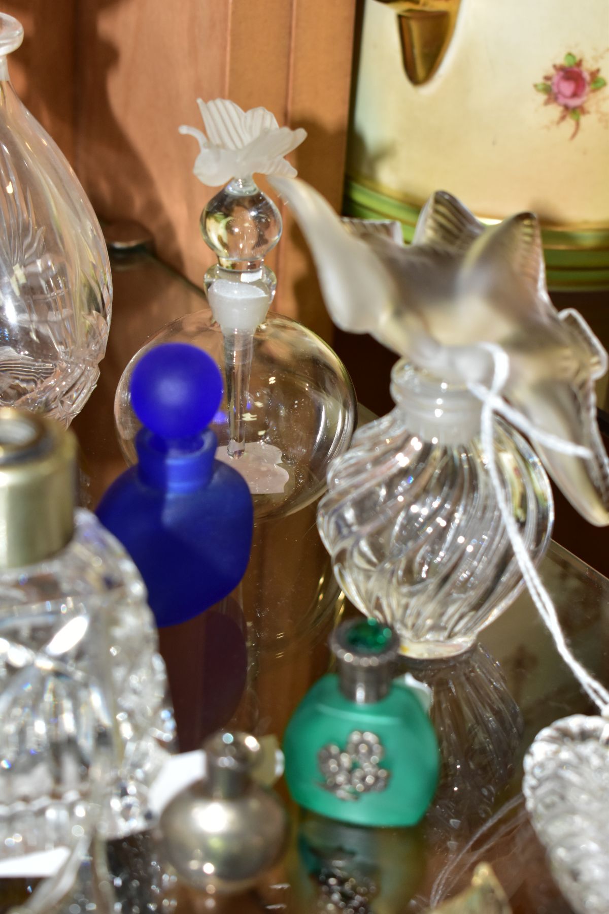 A COLLECTION OF 19TH AND 20TH CENTURY PERFUME BOTTLES , SPARE STOPPERS AND A FUNNEL, mostly glass, - Image 8 of 16