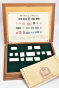 A CASED 'THE STAMPS OF ROYALTY' SILVER STAMP COLLECTION, an incomplete set of silver 'Stamps of