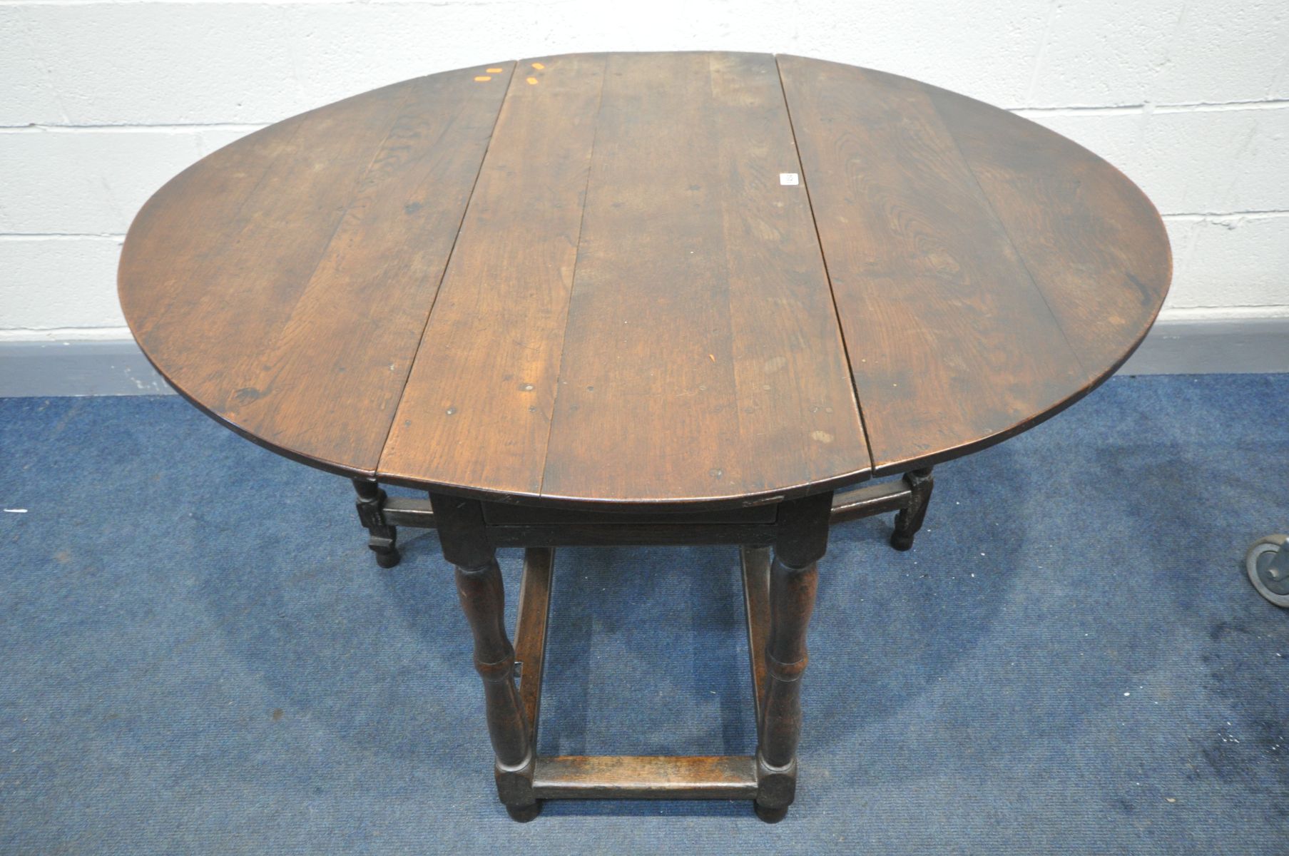 AN 18TH CENTURY JOINT OAK OVAL TOP GATE LEG TABLE, with two drawers, on block and turned legs united - Image 2 of 4