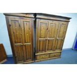 A PINE TRIPLE DOOR WARDROBE, with two drawers, width 152cm x depth 62cm x height 204cm, and a