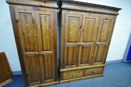 A PINE TRIPLE DOOR WARDROBE, with two drawers, width 152cm x depth 62cm x height 204cm, and a