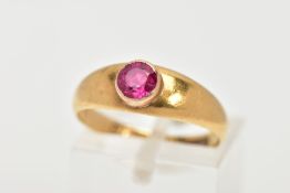 AN 18CT GOLD RUBY RING, a circular cut ruby, bezel set, domed tapered band, approximate width 6mm to