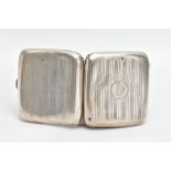 A SILVER CIGARETTE CASE, of a rounded square form, engine turned design with engraved monogram,