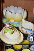 TWO PIECES OF CLARICE CLIFF NEWPORT POTTERY AND A ROYAL STAFFORDSHIRE CLARICE CLIFF WATER LILY