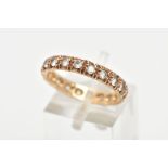 A 9CT GOLD FULL ETERNITY RING, set with circular cut colourless cubic zirconia, hallmarked 9ct