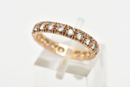 A 9CT GOLD FULL ETERNITY RING, set with circular cut colourless cubic zirconia, hallmarked 9ct