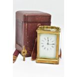 A BRASS CARRIAGE CLOCK WITH CASE, a white dial, roman numerals and blue hands, within a brass and