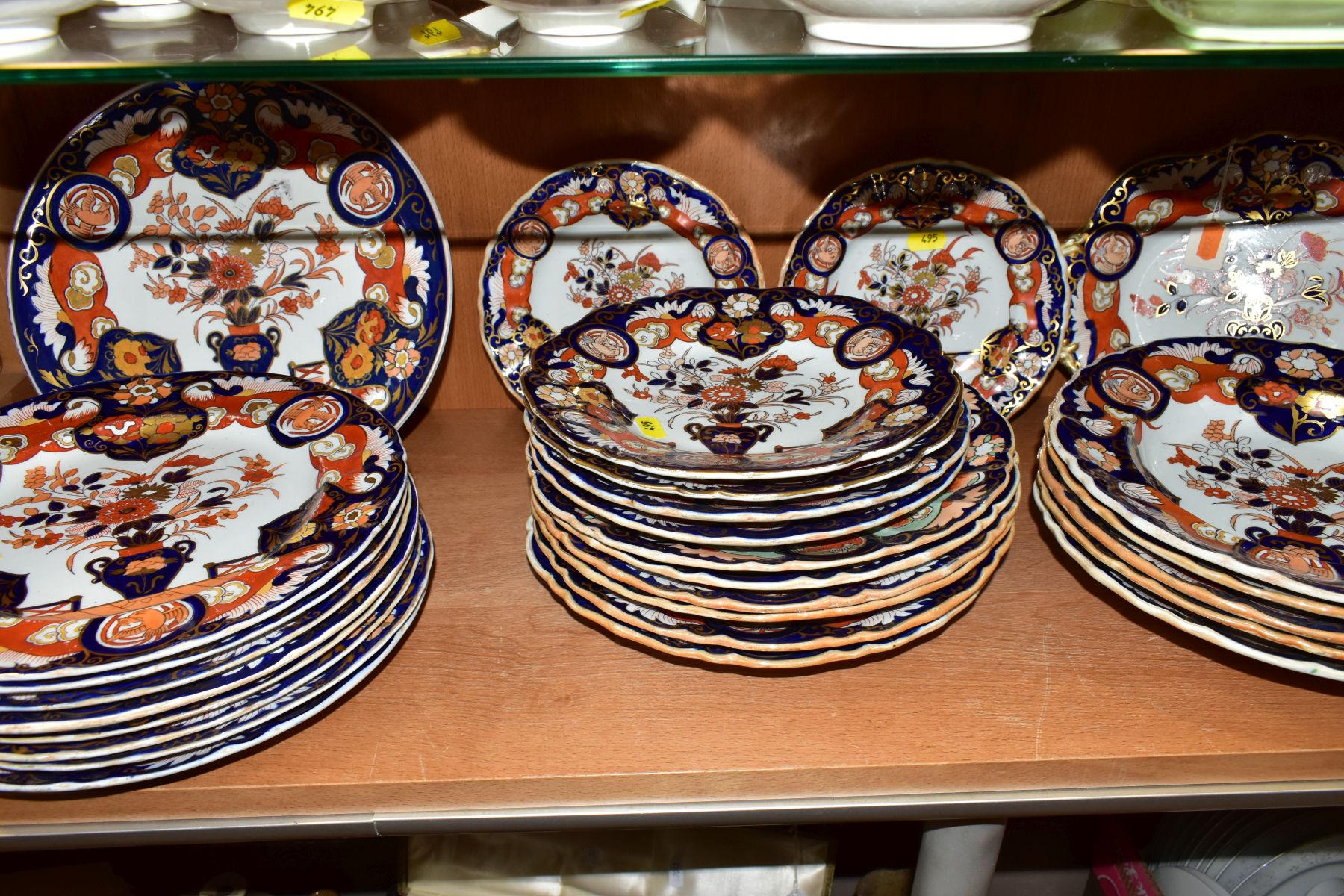 A MATCHED 19TH CENTURY IRONSTONE IMARI PART DINNER SERVICE, comprising Masons Ironstone twin handled