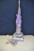 A DYSON DC07 ANIMAL UPRIGHT VACUUM CLEANER with upholstery attachment (PAT pass and working)