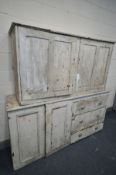 A PAINTED 19TH CENTURY CABINET, with double panelled cupboard doors, besides three drawers, width