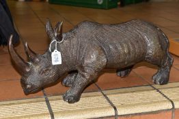 A BRONZE RHINOCEROS FIGURE, height 18cm, length 50cm, heavy (Condition report: good, no obvious