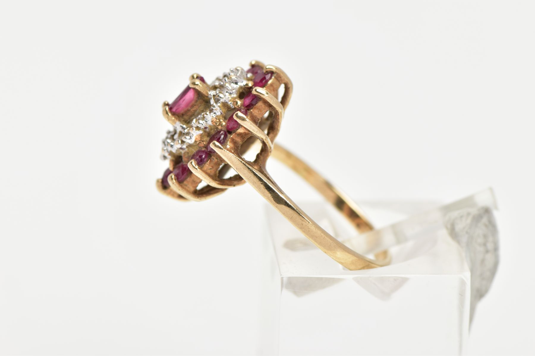 A 9CT GOLD RUBY AND DIAMOND CLUSTER RING, slightly raised cluster of a navette form, set with a - Image 2 of 4
