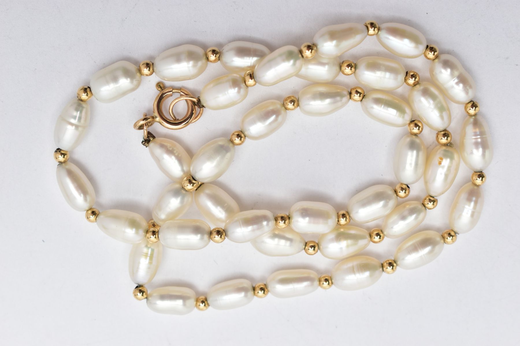 A CULTURED FRESHWATER PEARL NECKLACE, thirty-eight baroque fresh water pearls interspaced between - Image 3 of 3