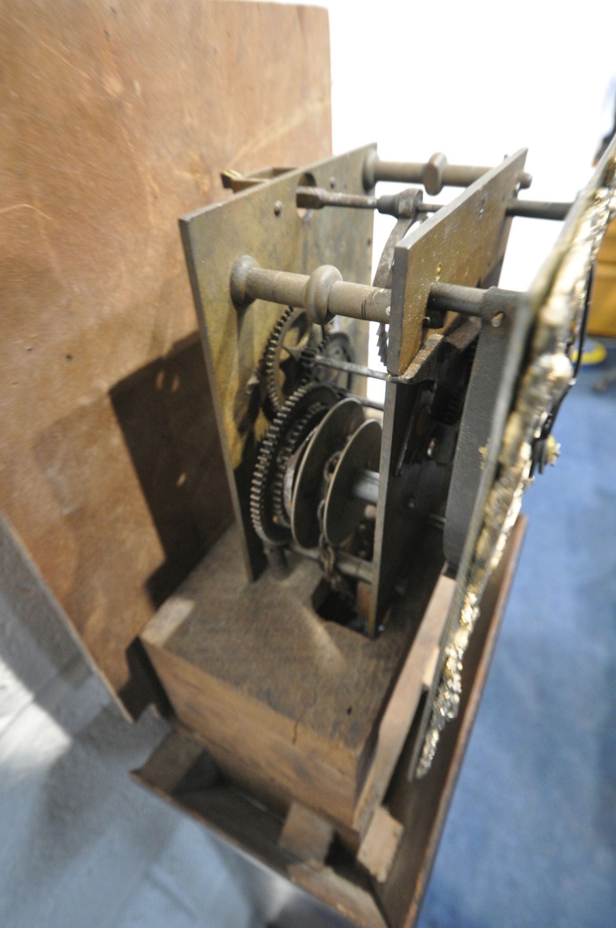 AN OAK GRANDDAUGHTER CLOCK, the square hood enclosing a brass and silvered dial, spandrels to each - Image 3 of 3