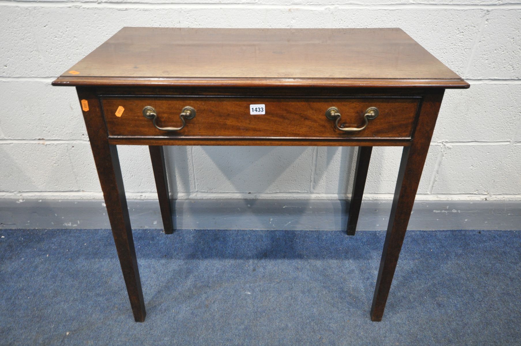 A GEORGIAN MAHOGANY SIDE TABLE, with a single long drawer, on square tapering legs, width 85cm x