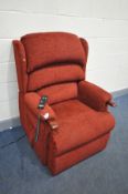 A HSL RED UPHOLSTERED ELECTRIC RISE AND RECLINE ARMCHAIR (PAT pass and working)