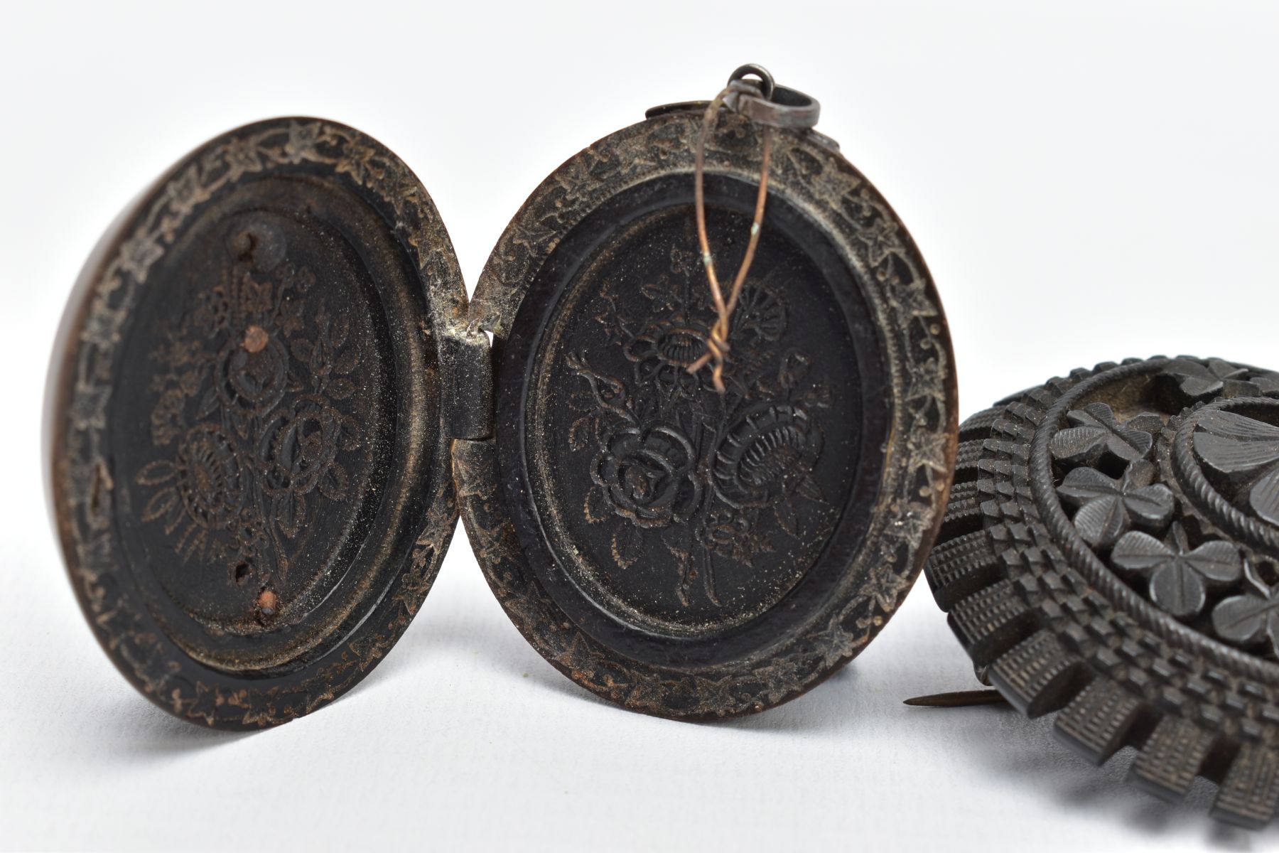 A JET BROOCH AND A VULCANITE PENDANT, the jet brooch of a circular form, decorated with carved - Image 5 of 6