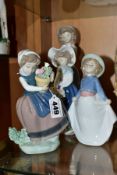 TWO LLADRO AND TWO NAO PORCELAIN FIGURES OF GIRLS, the Lladro comprising Spring is Here, model no.