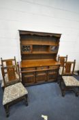 AN OLD CHARM DARK OAK DRESSER, with two upper lead glazed doors, above a base with three drawers and