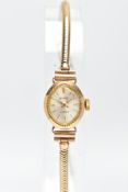 A LADYS 9CT GOLD WRISTWATCH, movement in need of some attention, oval silver dial signed '