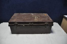 A VINTAGE GARRISON TIN TRUNK