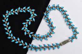 A WHITE METAL AND MARCACITE NECKLACE, set with marquise cut blue cabochon and circular cut