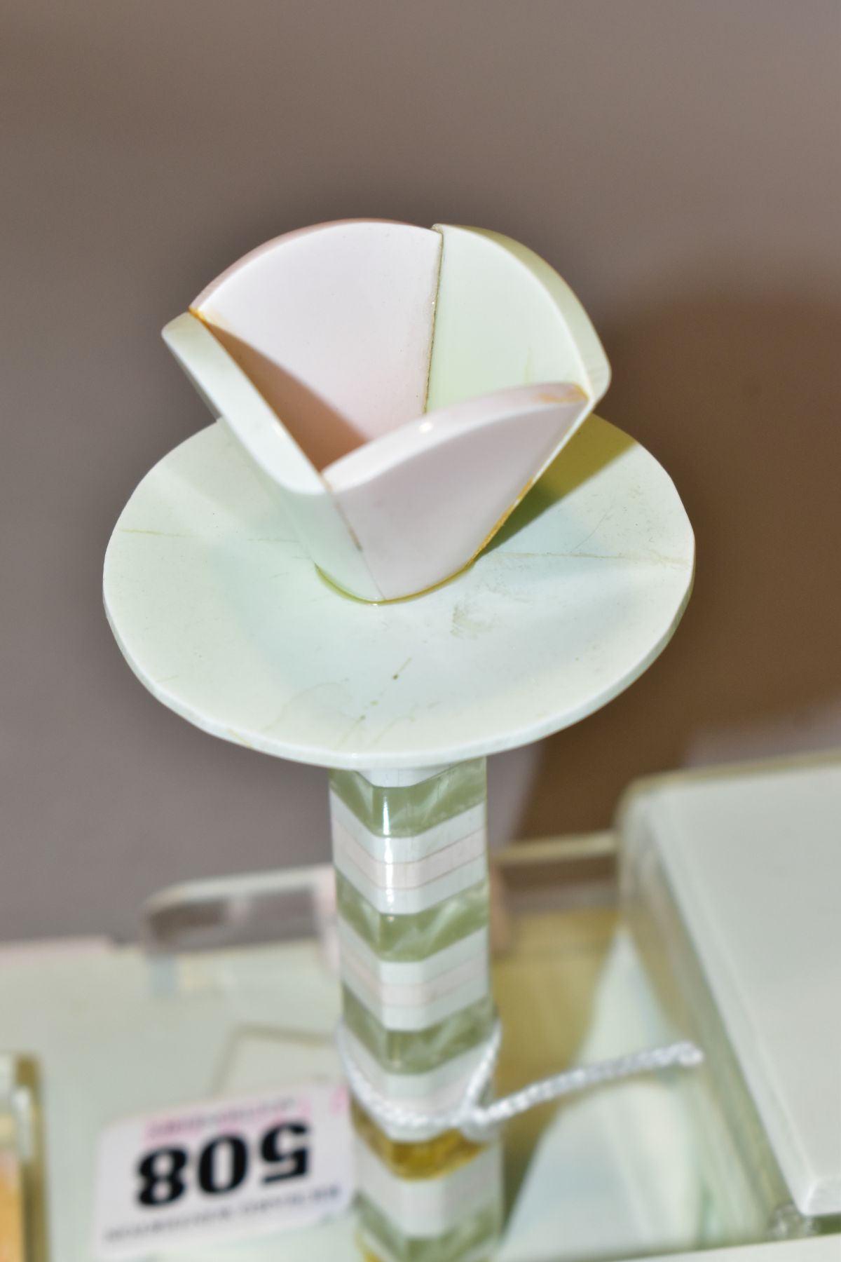 AN ART DECO PINK, GREEN AND CLEAR PLASTIC DRESSING TABLE SET, comprising rectangular tray, a pair of - Image 10 of 12