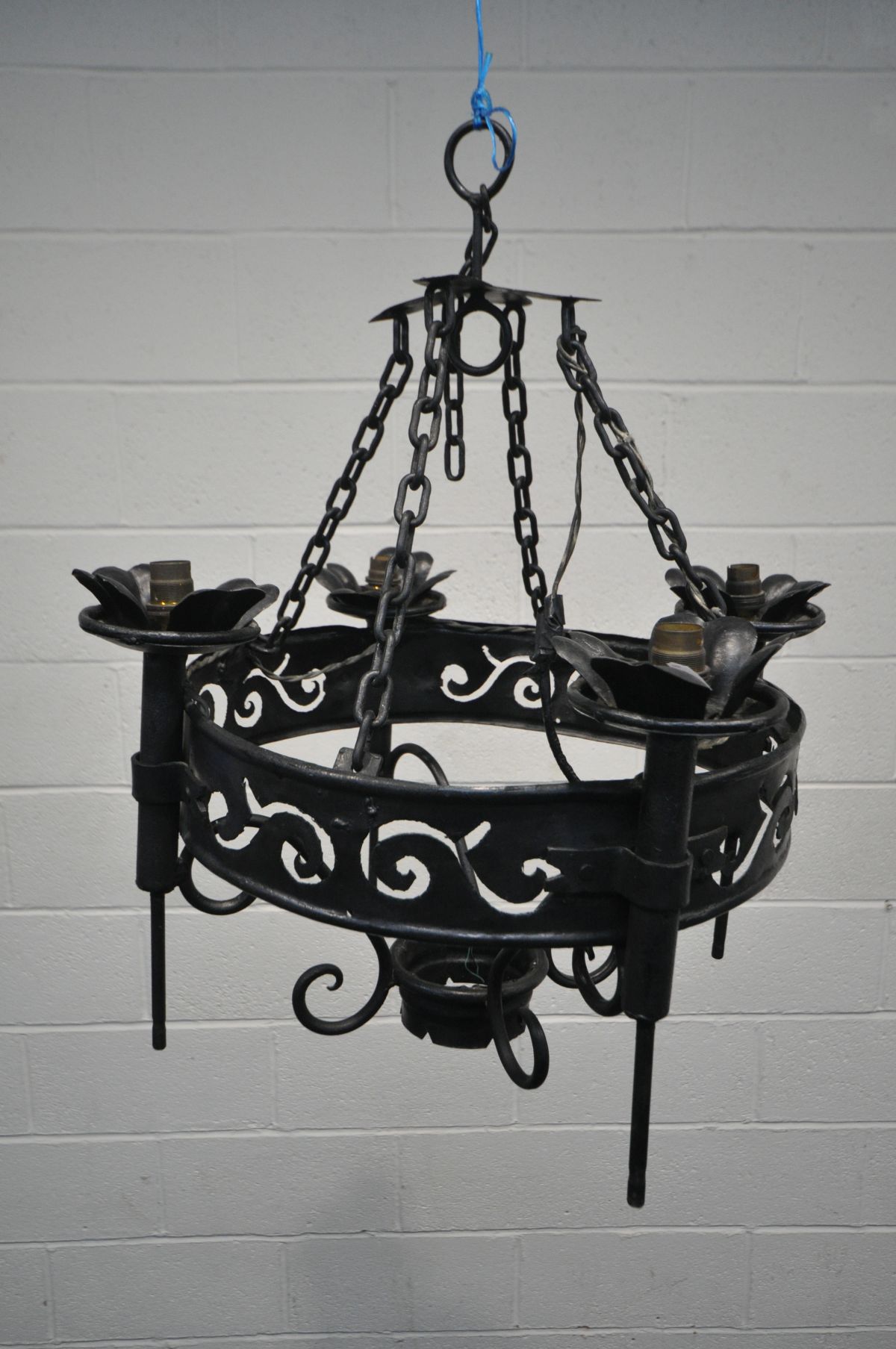 A WROUGHT IRON CIRCULAR CHANDELIER, with four light fittings, diameter 43cm x drop 62cm