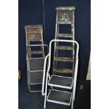 A PAIR OF METAL STEPLADDERS and a pair of vintage wooden ladders (4)