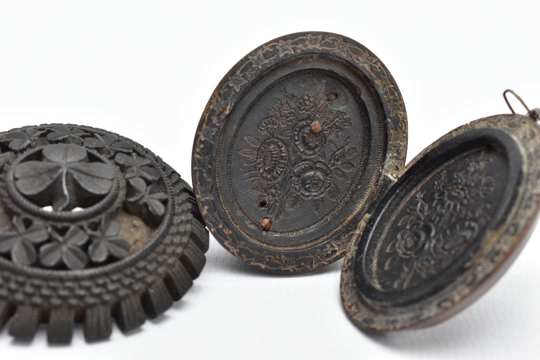 A JET BROOCH AND A VULCANITE PENDANT, the jet brooch of a circular form, decorated with carved - Image 6 of 6