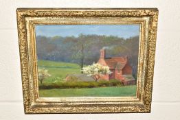 AN EARLY 20TH CENTURY LANDSCAPE OIL ON BOARD, depicting a female figure beside a cottage, initialled