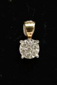 A 9CT GOLD DIAMOND PENDANT, of a circular form, set with seven round brilliant cut diamonds,