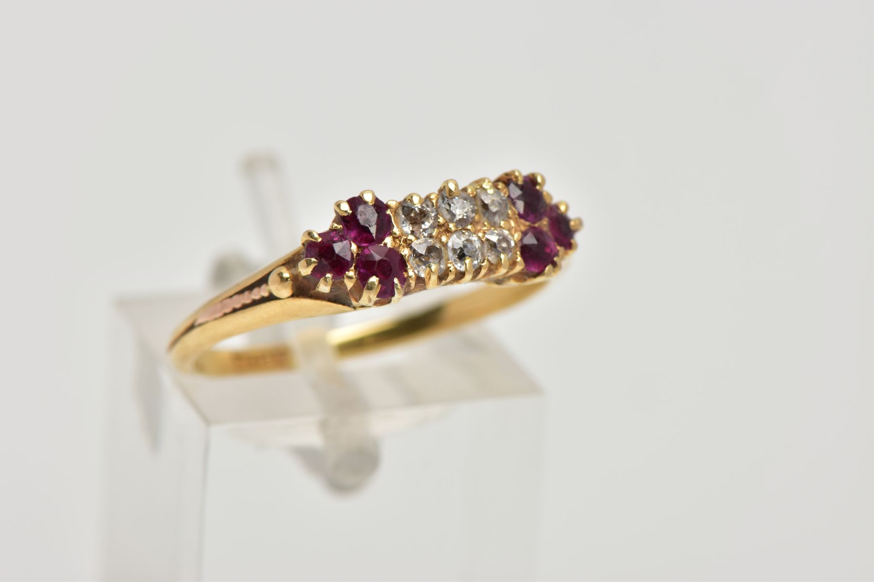 A DIAMOND AND RUBY RING, six old cut diamonds prong set in yellow metal, accented with three - Image 4 of 4