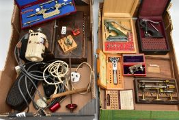 TWO BOXES OF WATCH MAKERS TOOLS AND EQUPIMENTS, to include a cased 'Seitz' pusher press with