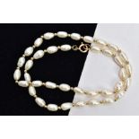 A CULTURED FRESHWATER PEARL NECKLACE, thirty-eight baroque fresh water pearls interspaced between