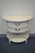 A LAURA ASHLEY CRRAM PAINTED DEMI LUNE HALL TABLE, with two drawers, on turned legs united by an
