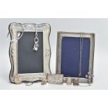 TWO SILVER PHOTO FRAMES AND AN ASSORTMENT OF SILVER AND WHITE METAL JEWELLERY, the first frame