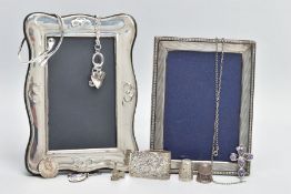 TWO SILVER PHOTO FRAMES AND AN ASSORTMENT OF SILVER AND WHITE METAL JEWELLERY, the first frame