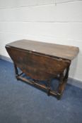 AN 18TH CENTURY JOINT OAK OVAL TOP GATE LEG TABLE, with two drawers, on block and turned legs united